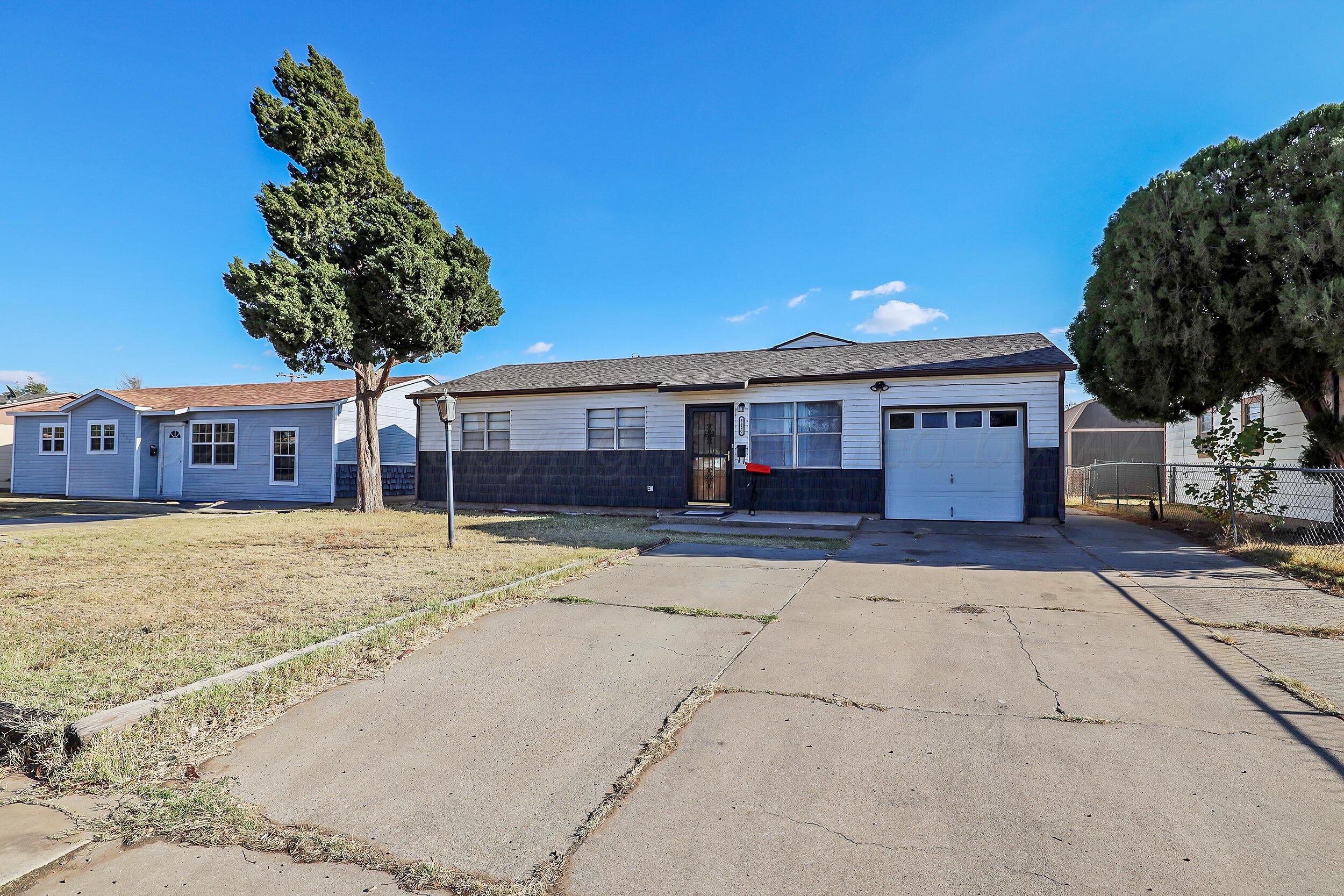 3820 Beaver Drive Amarillo, TX 79107 - Photo 1 of 25 a view of a house with a swimming pool
