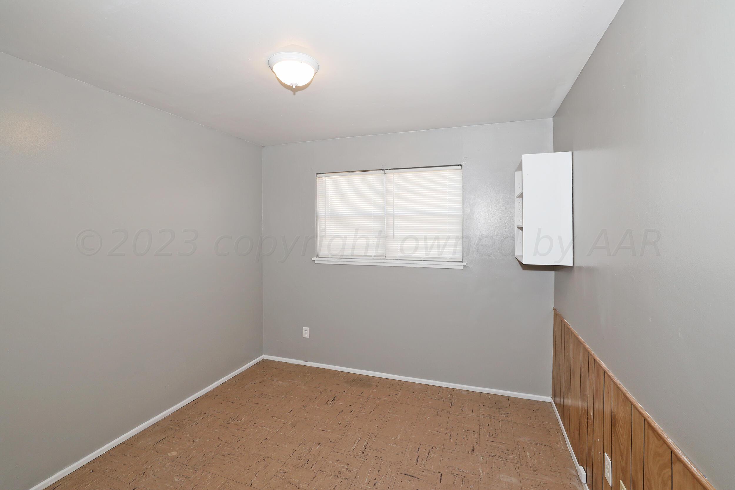 3820 Beaver Drive Amarillo, TX 79107 - Photo 12 of 25 an empty room with windows