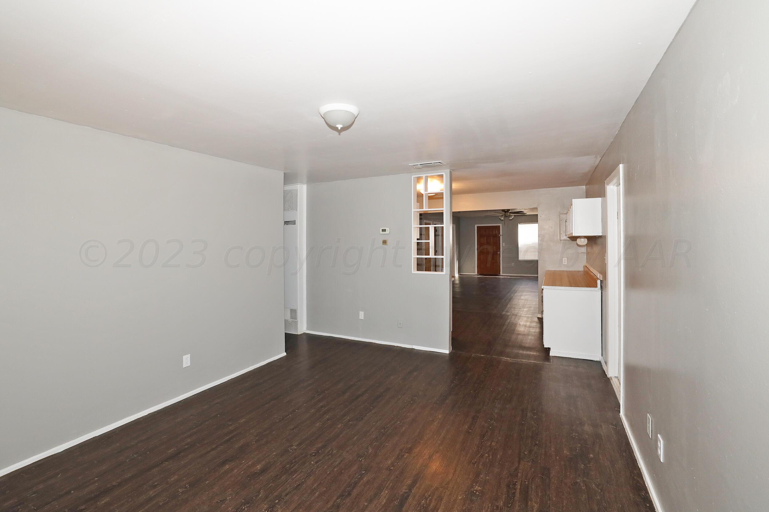 3820 Beaver Drive Amarillo, TX 79107 - Photo 18 of 25 a view of a kitchen with wooden floor