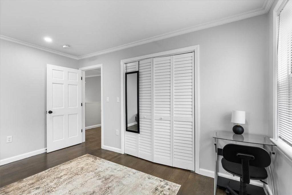 77 Cedar Street Boston, MA 02119 - Photo 20 of 25 a view of a livingroom with a workspace