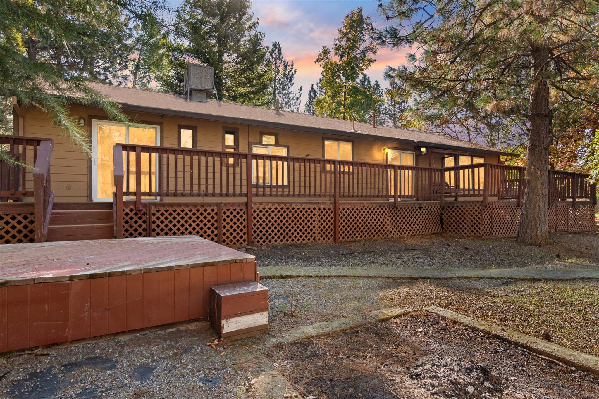 28449 Whippoorwill Circle Shingletown, CA 96088 - Photo 2 of 47 a front view of a house with a yard