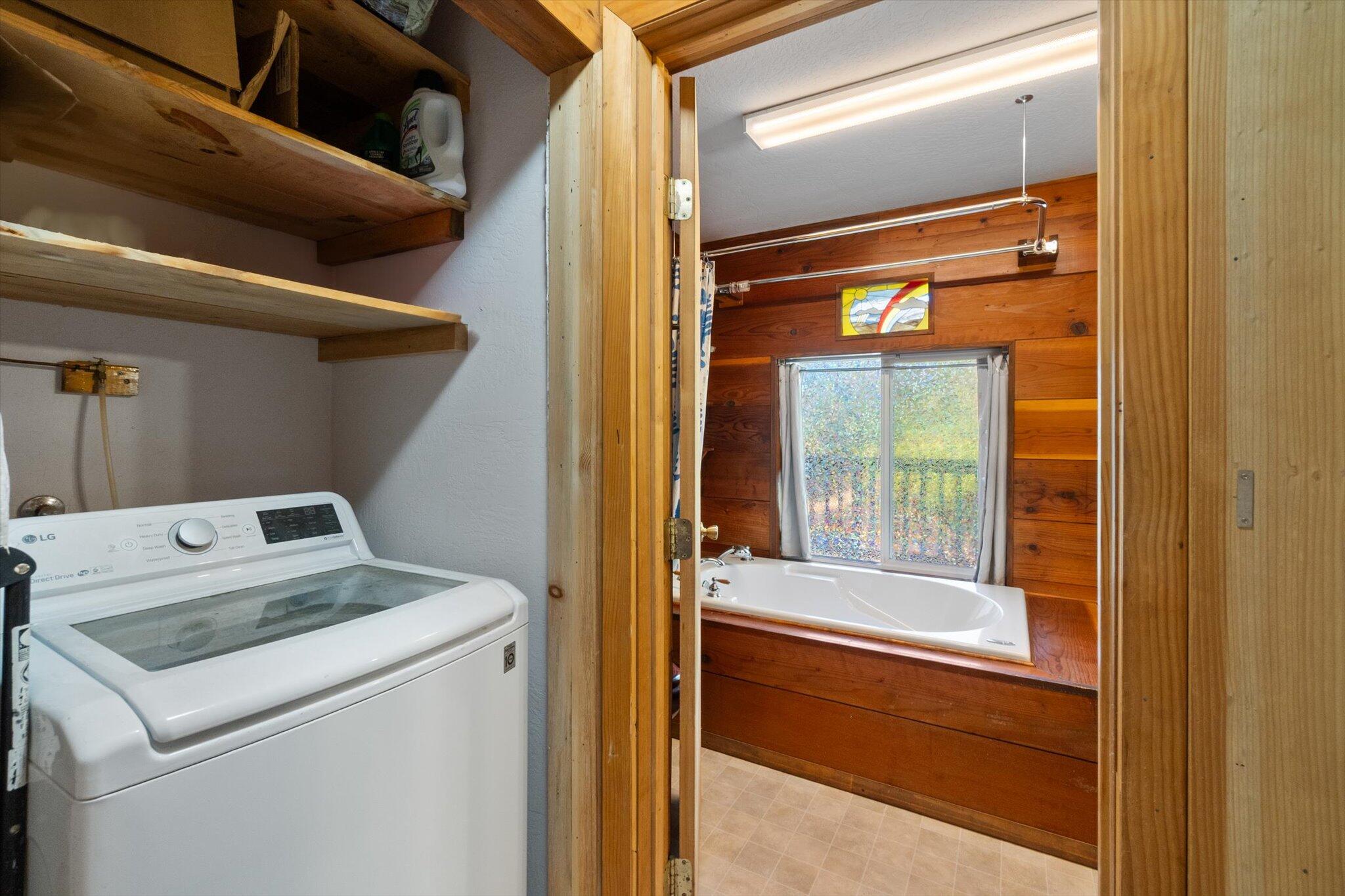 28449 Whippoorwill Circle Shingletown, CA 96088 - Photo 21 of 47 a utility room with dryer and washer