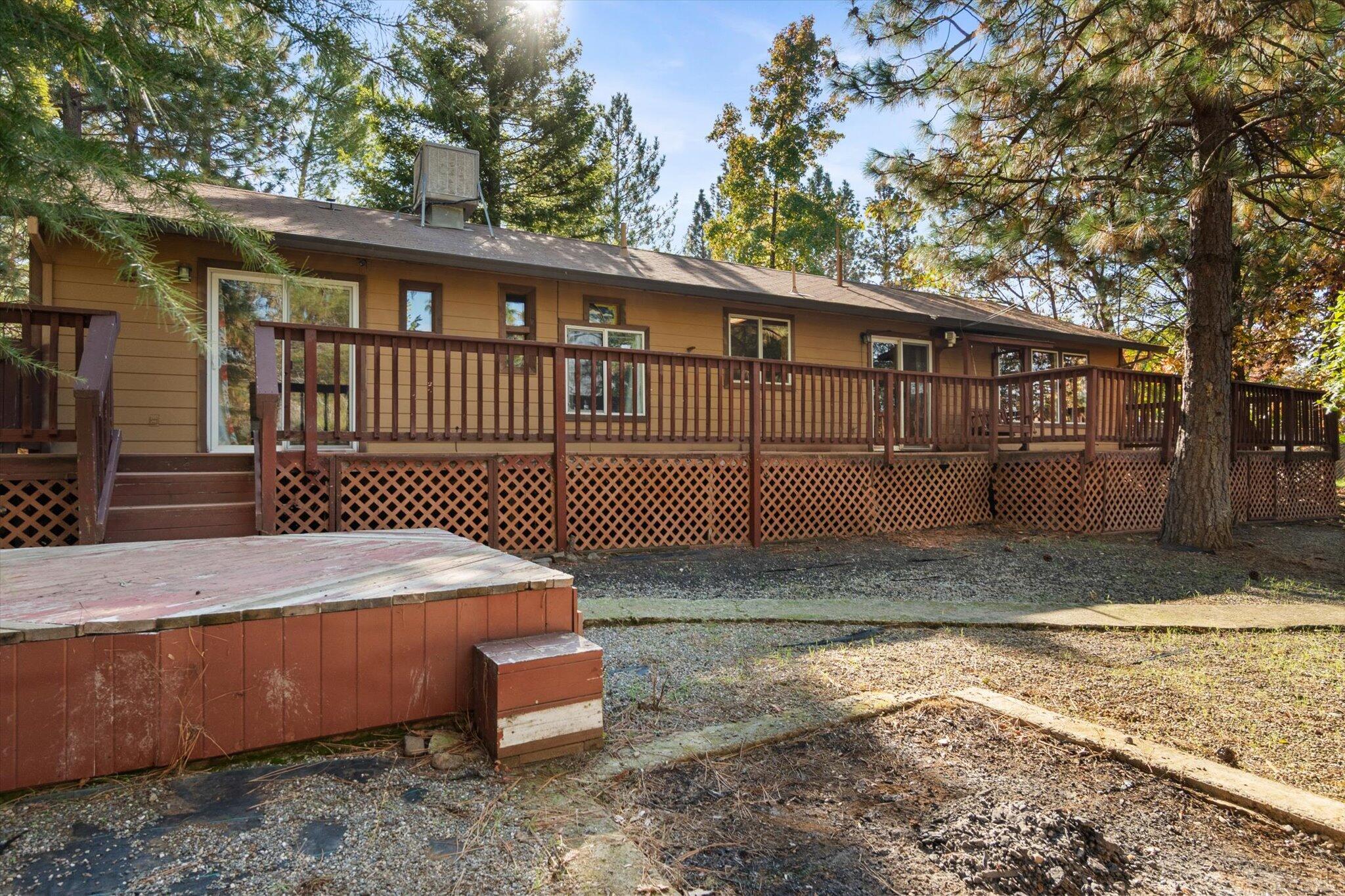 28449 Whippoorwill Circle Shingletown, CA 96088 - Photo 27 of 47 a front view of a house with garden