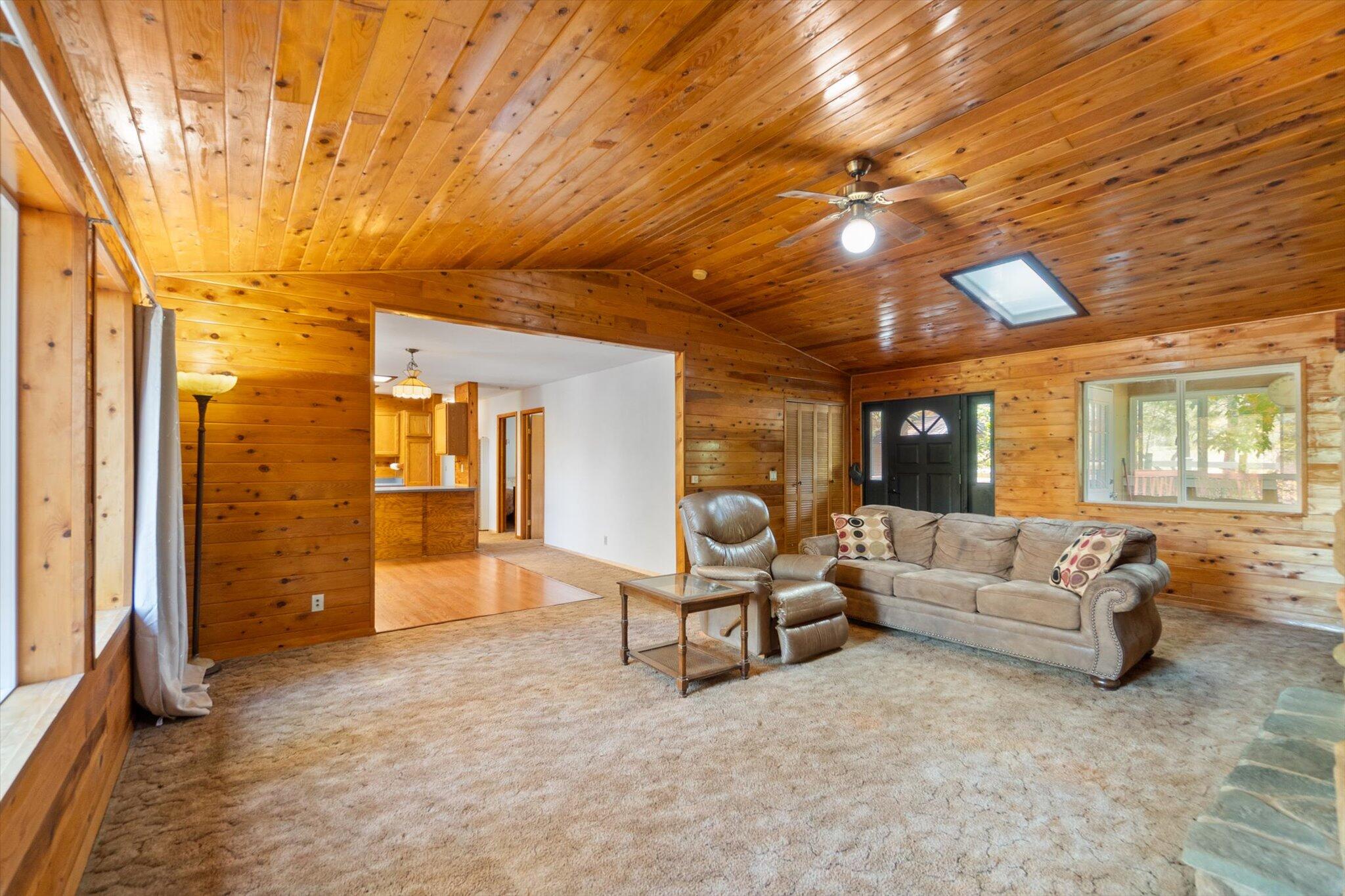 28449 Whippoorwill Circle Shingletown, CA 96088 - Photo 6 of 47 a living room with furniture and a large window