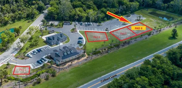 an aerial view of residential house with outdoor space and swimming pool