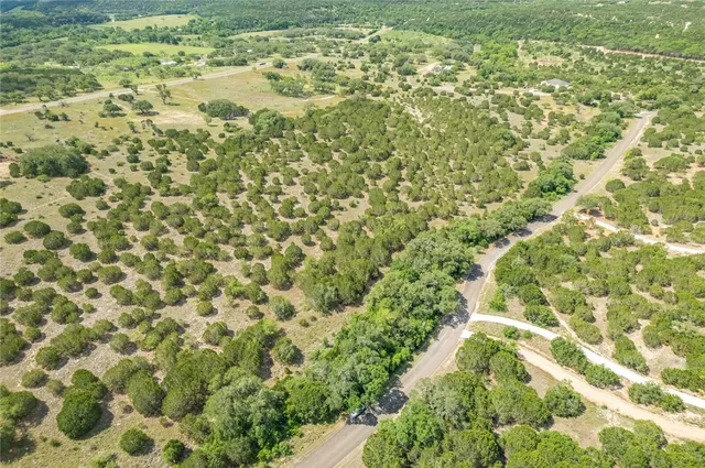 a view of a yard with an outdoor space
