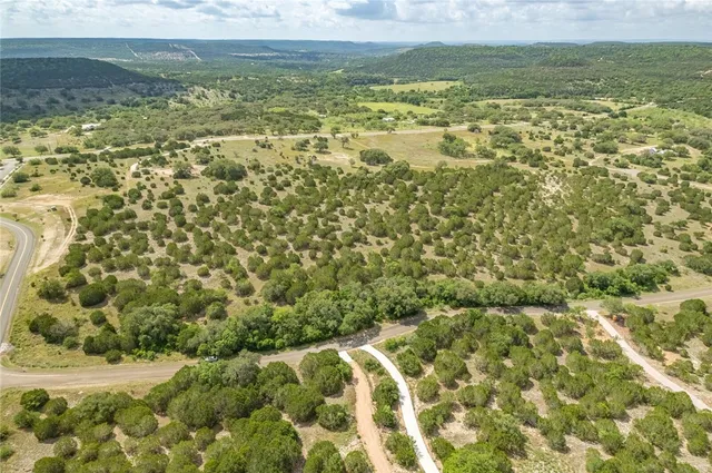 a bathroom with a shower curtain