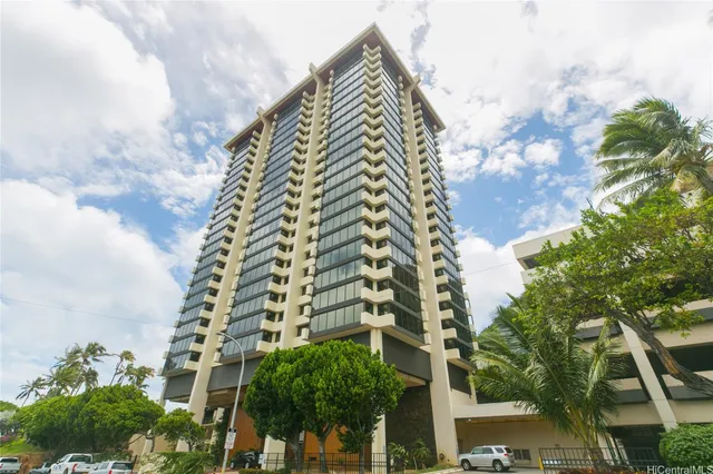 a living room with furniture and a clock
