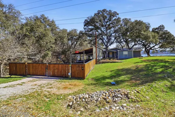 a view of swimming pool with a yard