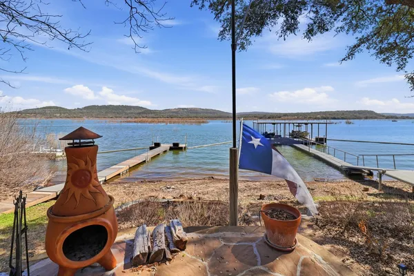 a view of a water with a fountain in front of it