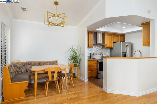 a kitchen with granite countertop furniture and a dining table