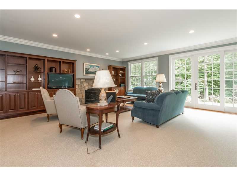 46 Stony Brook Road Darien, CT 06820 - Photo 13 of 24 a living room with furniture and a large window