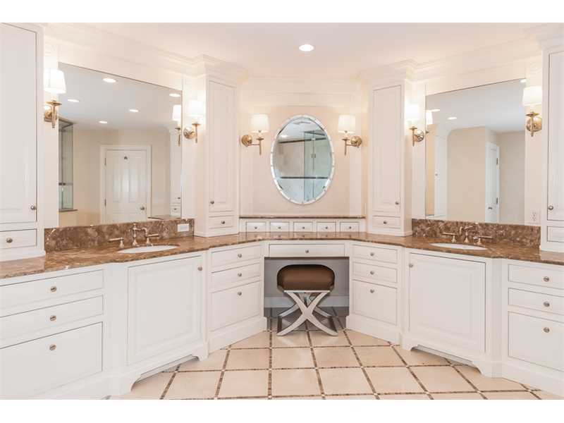 46 Stony Brook Road Darien, CT 06820 - Photo 15 of 24 a spacious bathroom with a granite countertop sink mirror and vanity