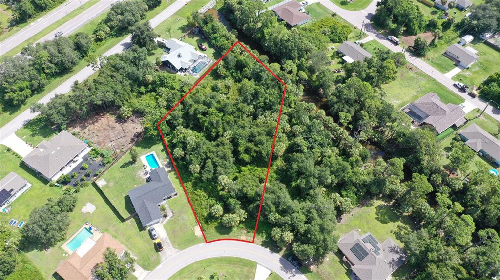 284 Hinton Street Port Charlotte, FL 33954 - Photo 9 of 16 an aerial view of a house with a yard