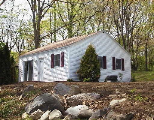 57 Knollcrest Road, Unit C3 New Fairfield, CT 06812 - Photo 1 of 1 a front view of a house with a yard