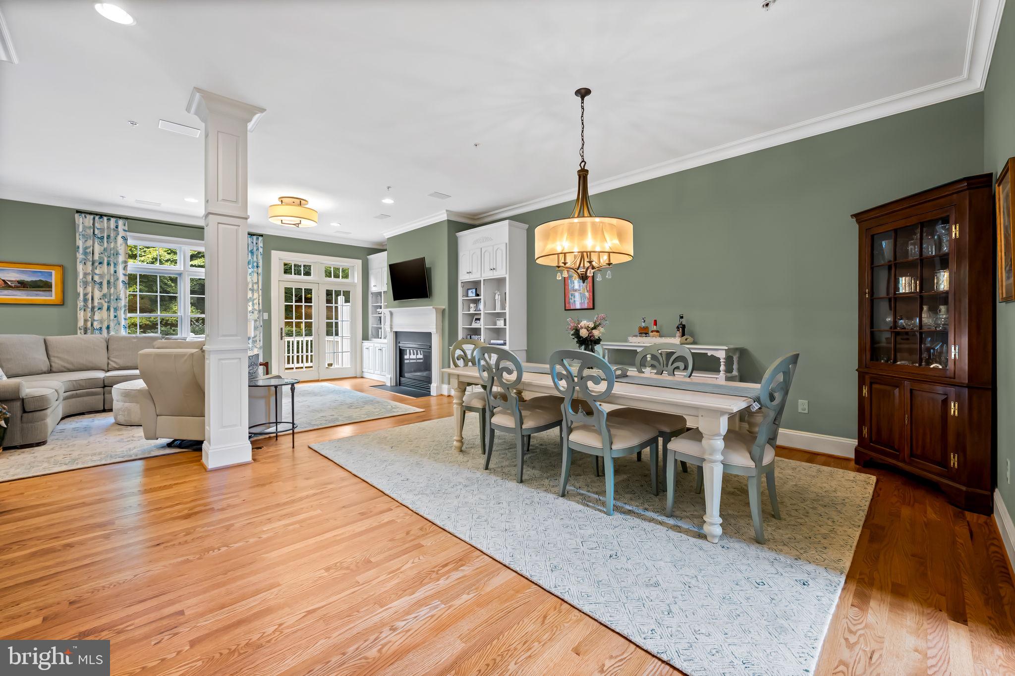 6509 Abbey View Way, Unit 22 Baltimore, MD 21212 - Photo 11 of 54 a view of a dining room with furniture window and wooden floor