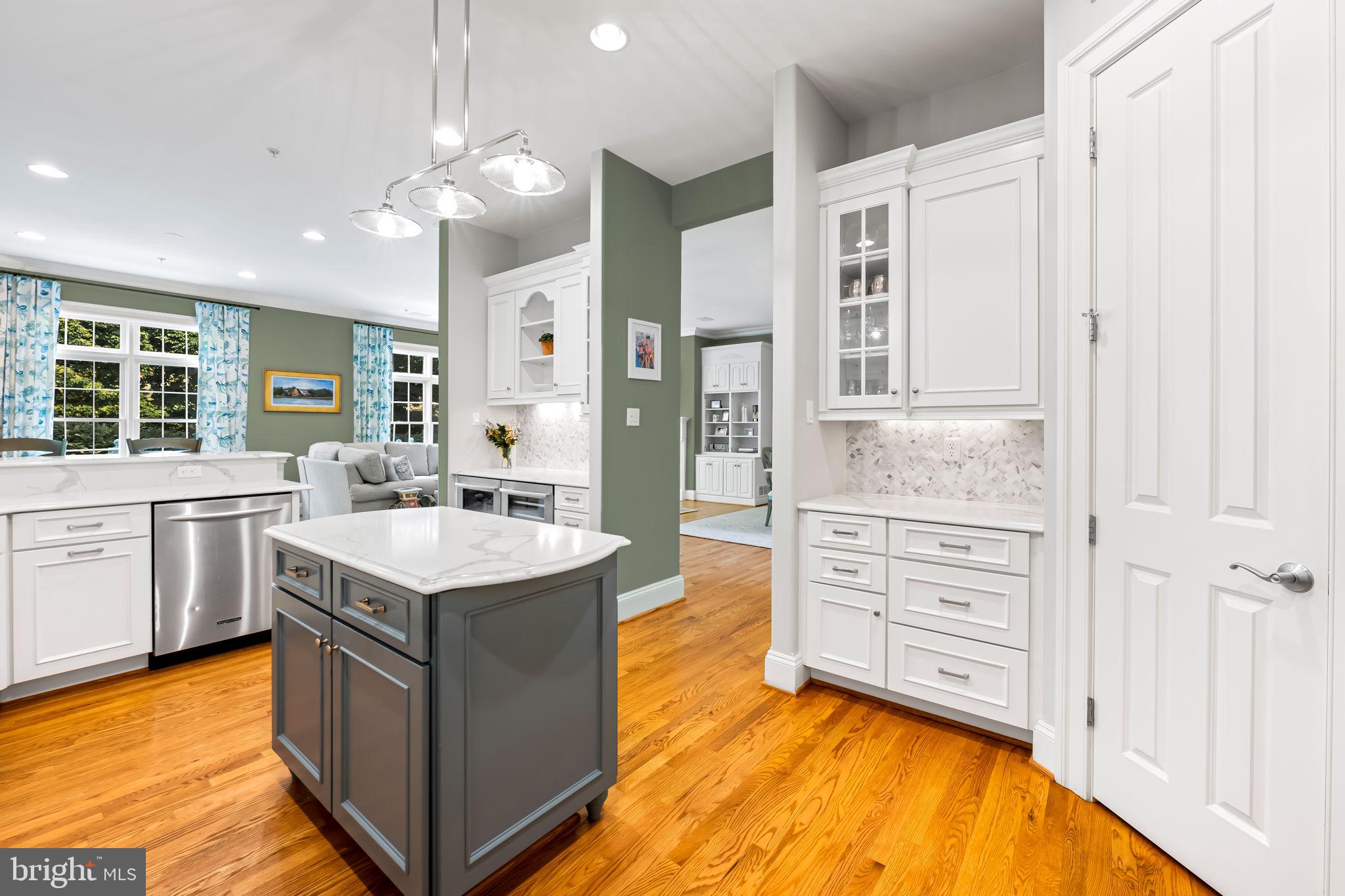 6509 Abbey View Way, Unit 22 Baltimore, MD 21212 - Photo 18 of 54 a kitchen with a sink stove and cabinets