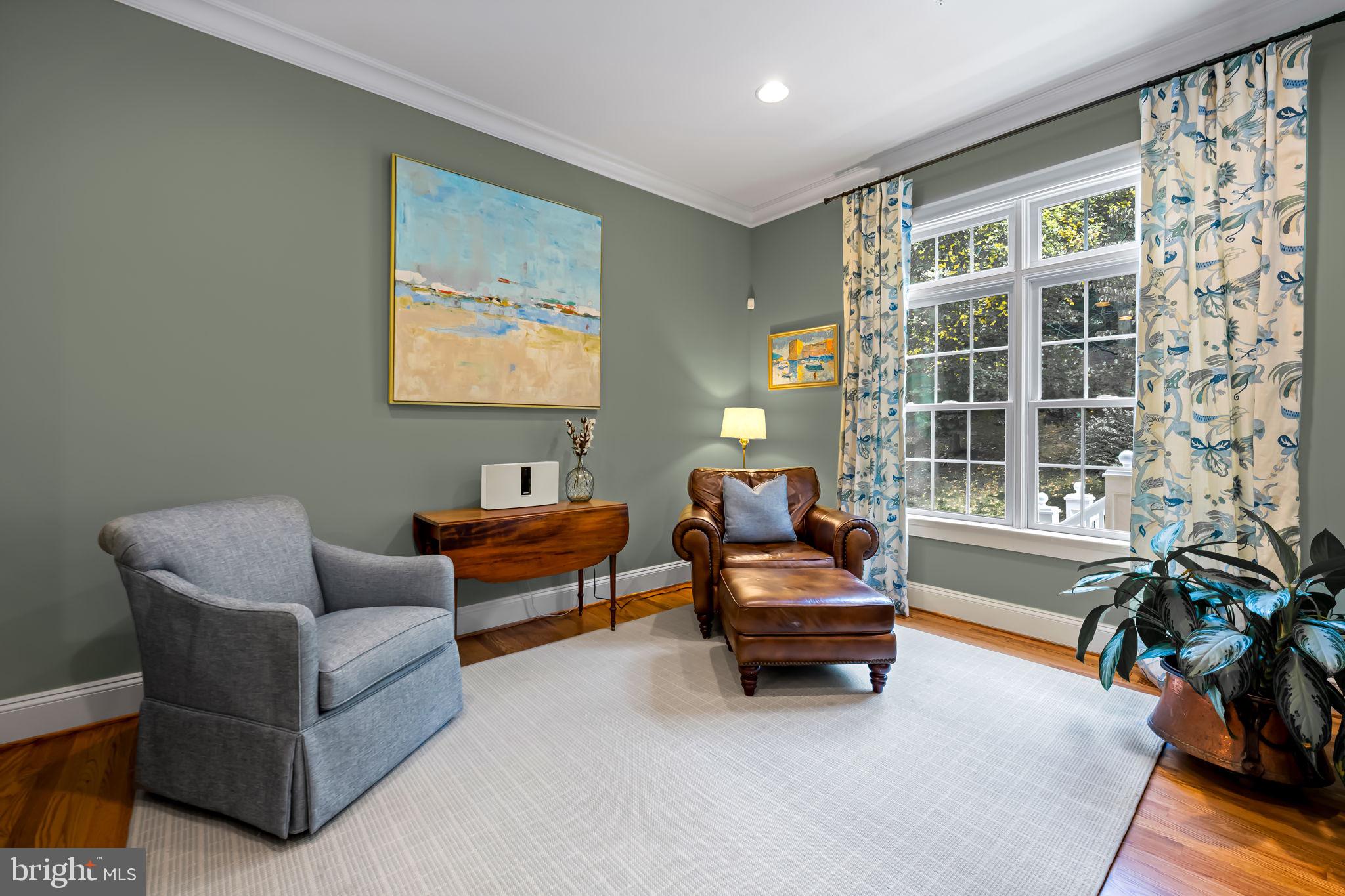 6509 Abbey View Way, Unit 22 Baltimore, MD 21212 - Photo 20 of 54 a living room with furniture and a large window