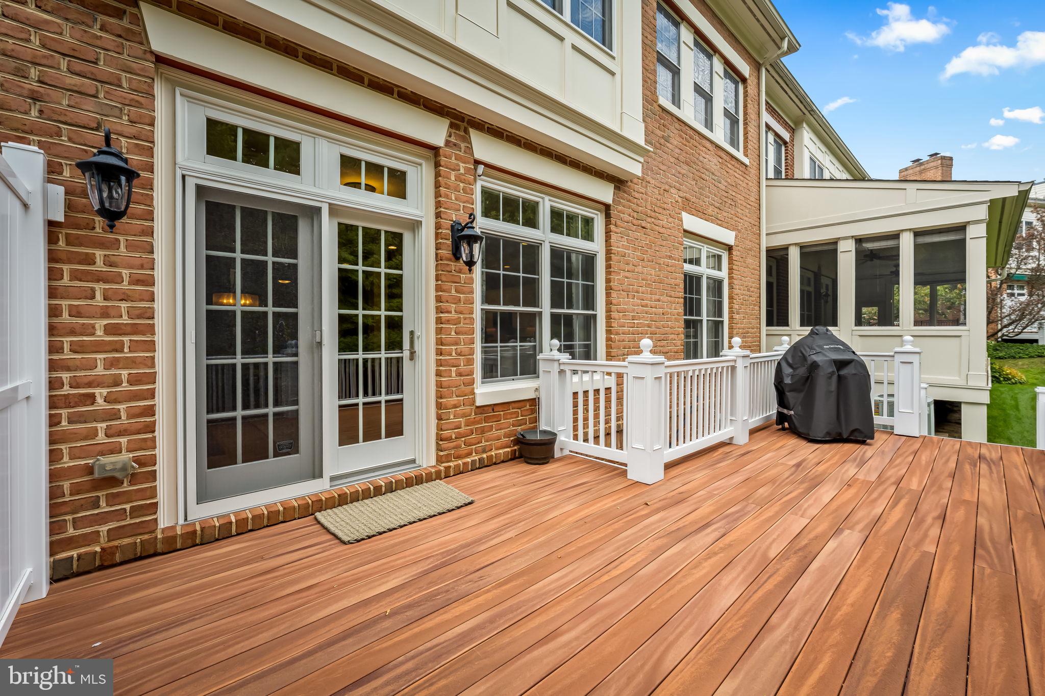 6509 Abbey View Way, Unit 22 Baltimore, MD 21212 - Photo 23 of 54 a view of a house with wooden floor and bench