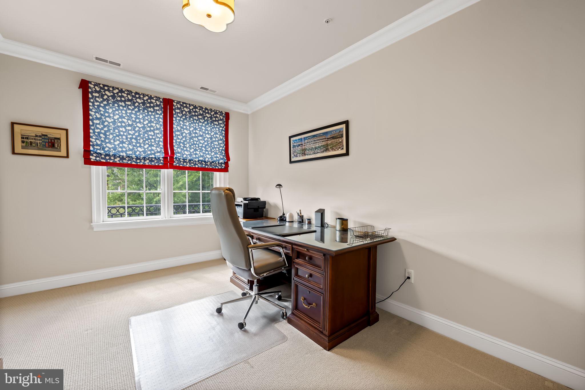 6509 Abbey View Way, Unit 22 Baltimore, MD 21212 - Photo 35 of 54 a view of a workspace with furniture and a window