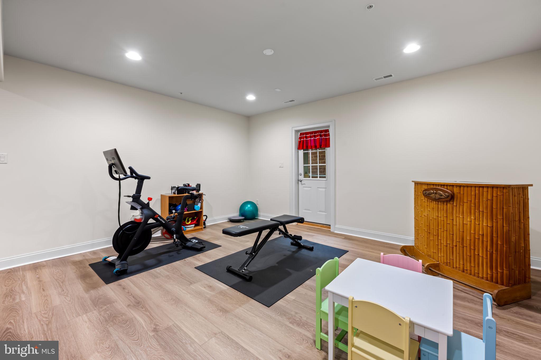 6509 Abbey View Way, Unit 22 Baltimore, MD 21212 - Photo 45 of 54 a room with furniture a air conditioner and a window