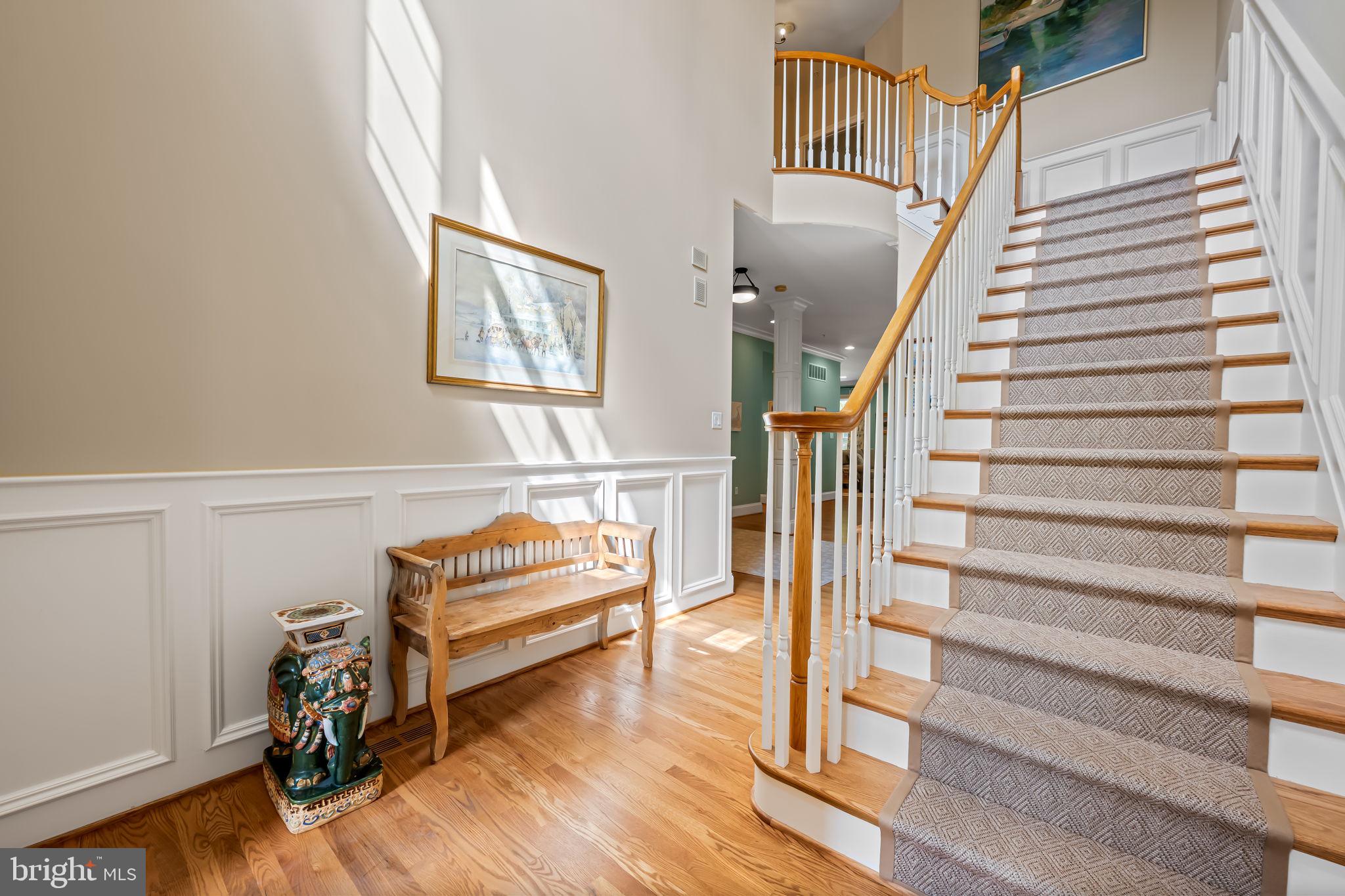 6509 Abbey View Way, Unit 22 Baltimore, MD 21212 - Photo 6 of 54 a view of entryway with wooden floor and front door