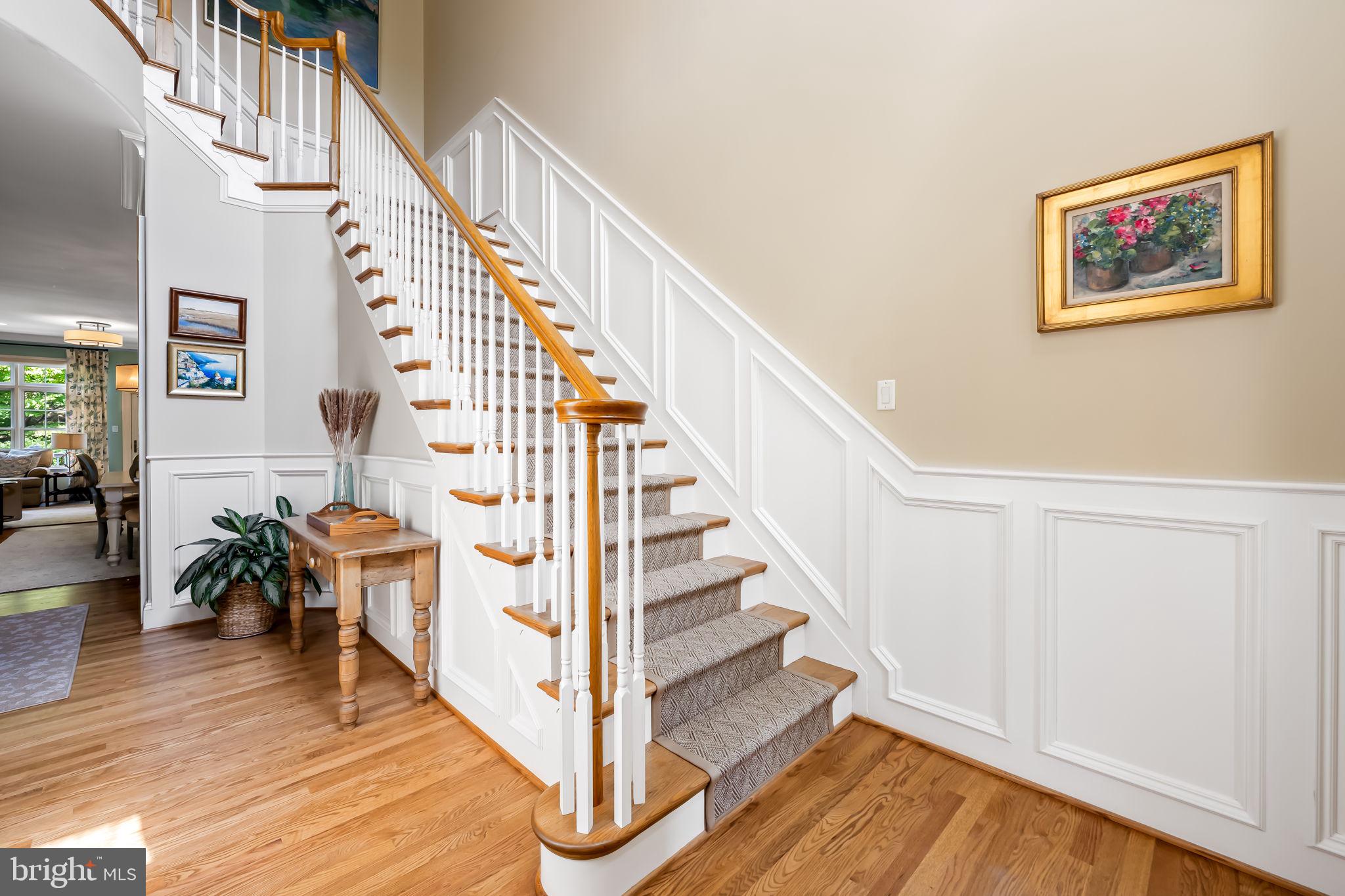 6509 Abbey View Way, Unit 22 Baltimore, MD 21212 - Photo 7 of 54 a view of entryway and hall with wooden floor