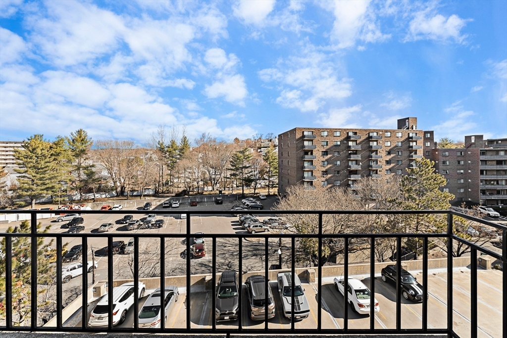 275 Main Street, Unit 205 Watertown, MA 02472 - Photo 14 of 42 a view of a city from a balcony