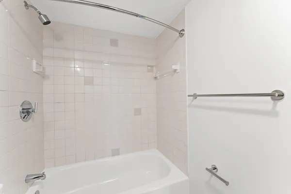 a bathroom with a sink vanity and a mirror