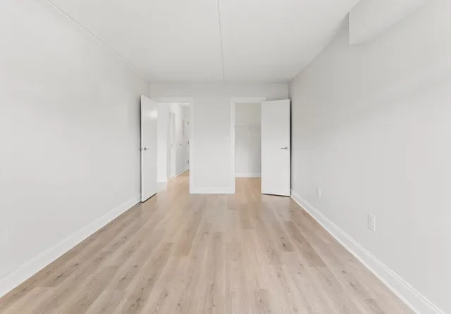 a view of a room with racks on the wall