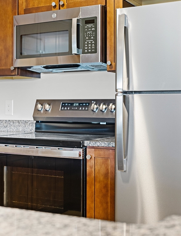 275 Main Street, Unit 205 Watertown, MA 02472 - Photo 6 of 42 a view of washer and dryer