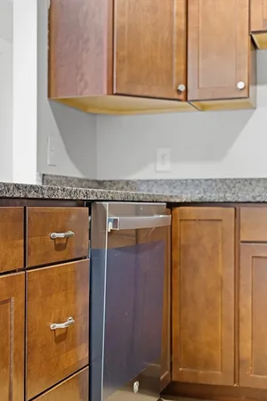 a kitchen with a stove and a microwave