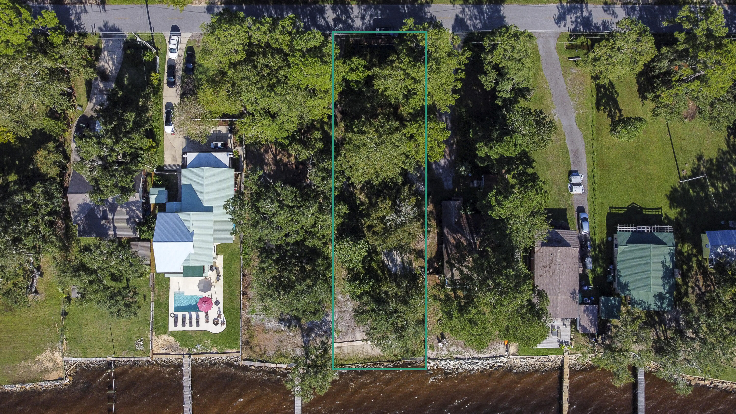 Lot 6-1 Bay Grove Road Freeport, FL 32439 - Photo 1 of 18 front view of a house with a street