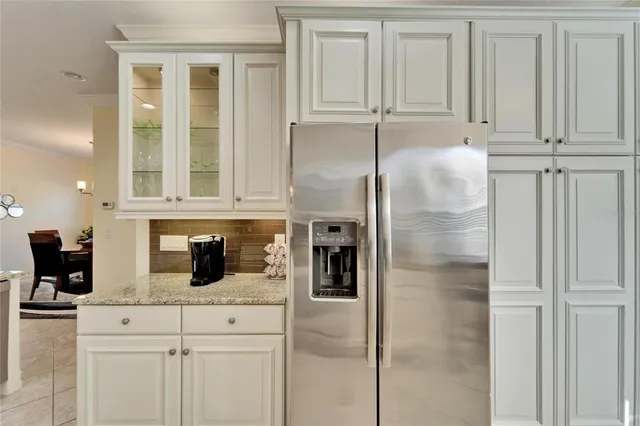 a bathroom with double sink and a mirror