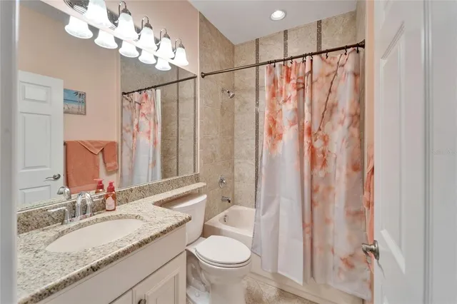 an aerial view of a house with outdoor space