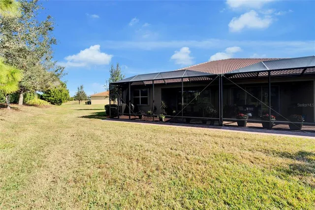 a view of a water fountain in the middle of a lake