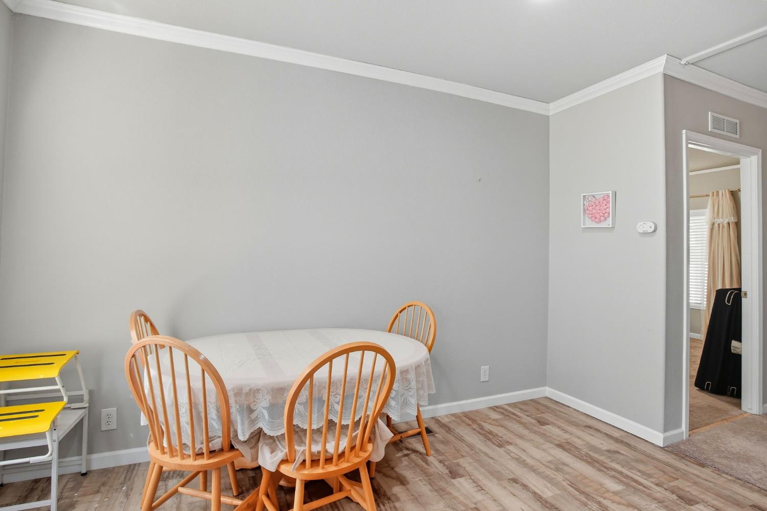 8665 Florin Road, Unit 133 Sacramento, CA 95828 - Photo 11 of 38 a view of a dining room with furniture