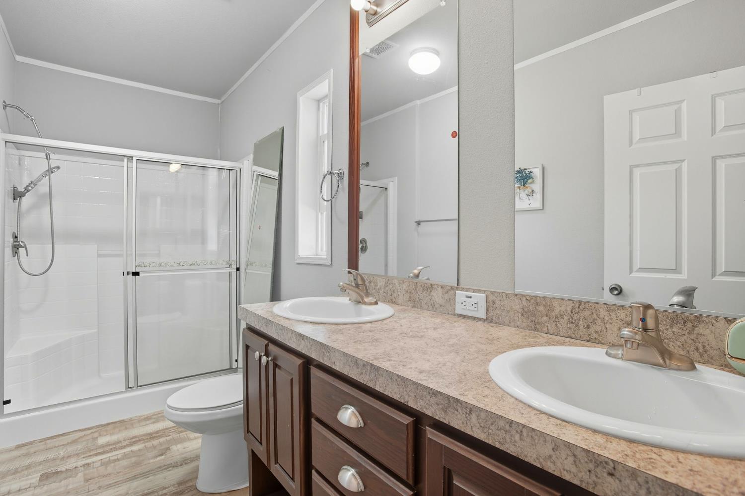 8665 Florin Road, Unit 133 Sacramento, CA 95828 - Photo 16 of 38 a bathroom with a granite countertop sink toilet and shower
