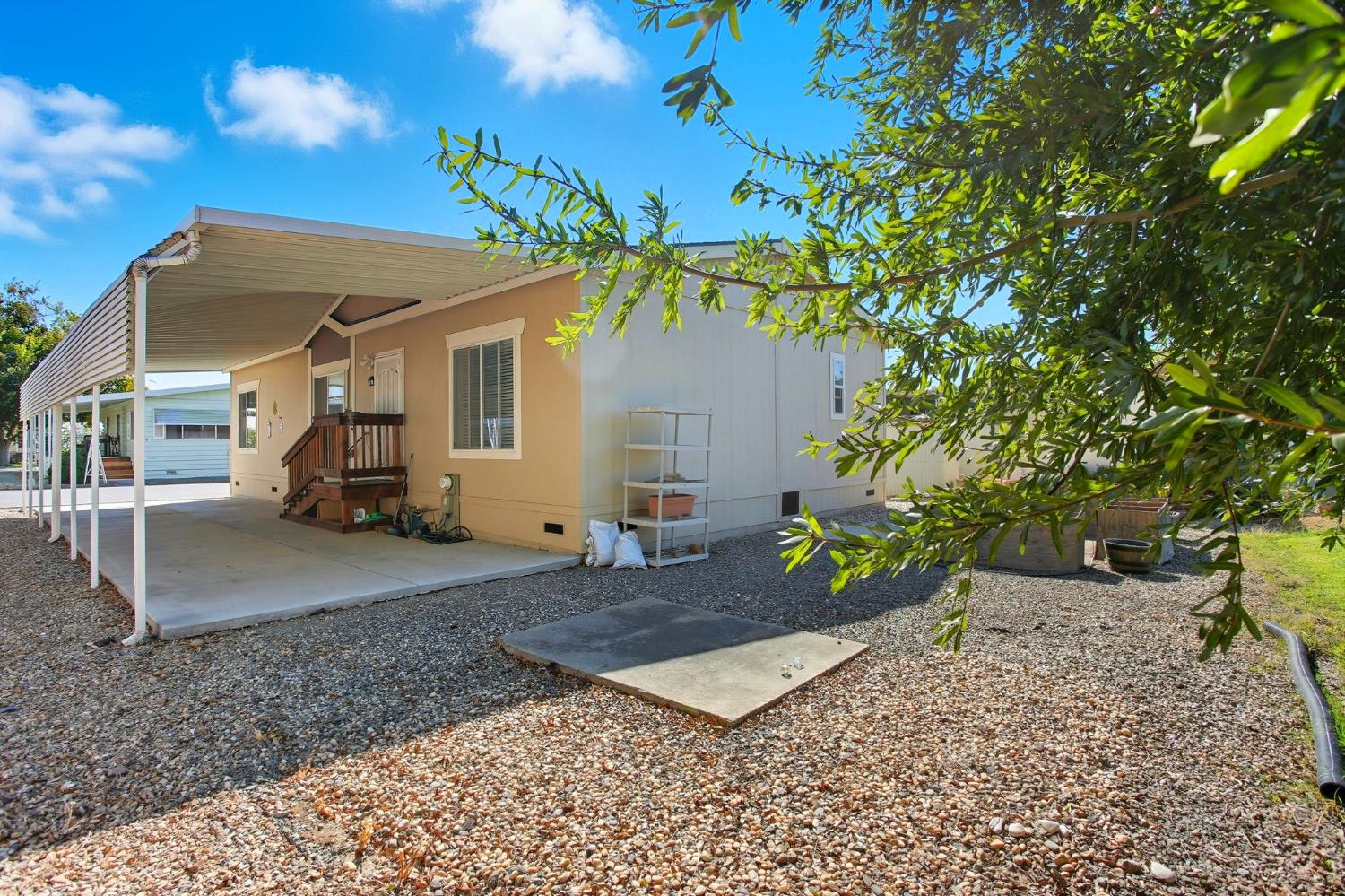 8665 Florin Road, Unit 133 Sacramento, CA 95828 - Photo 26 of 38 a view of a house with a patio