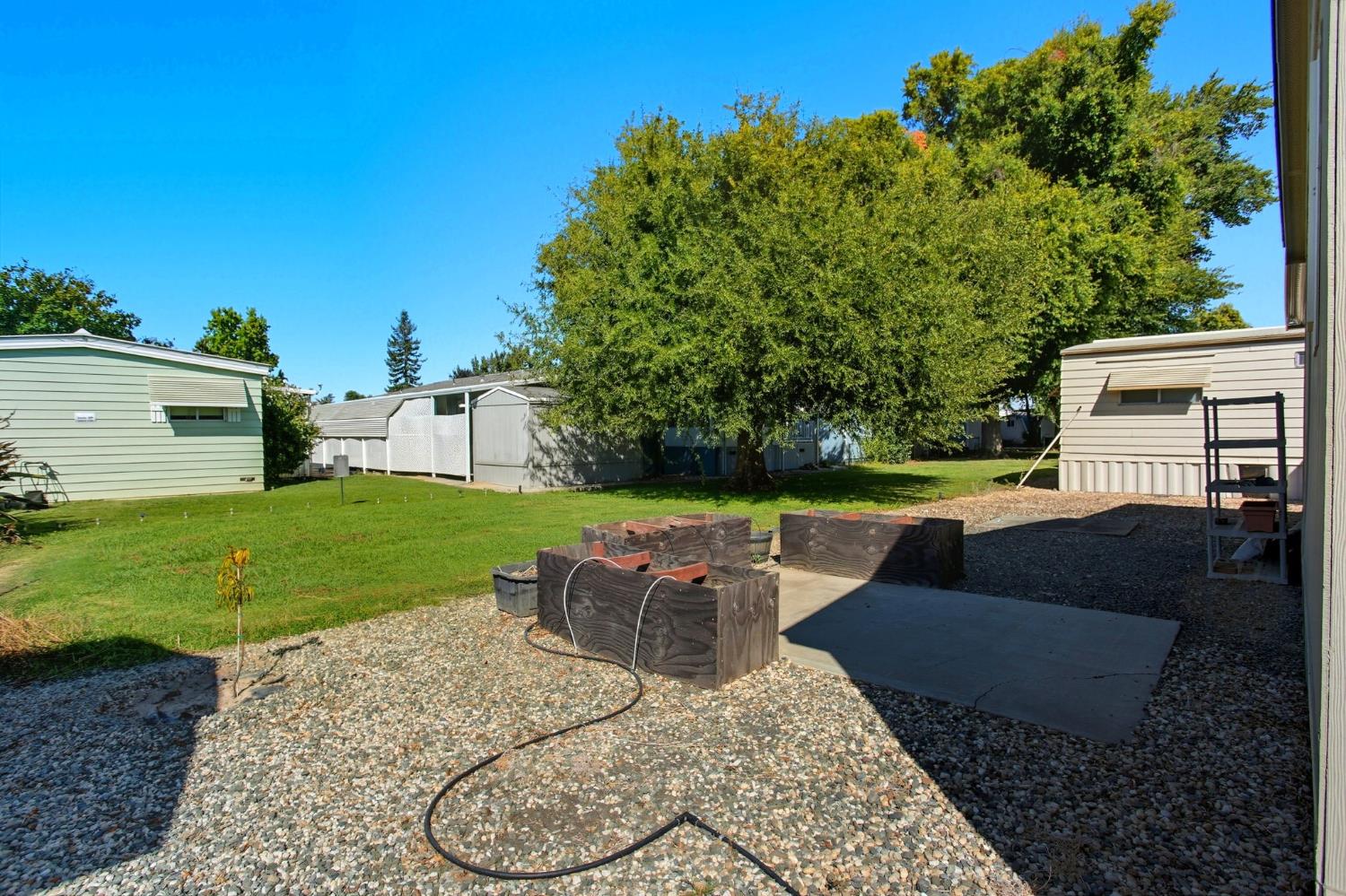 8665 Florin Road, Unit 133 Sacramento, CA 95828 - Photo 29 of 38 a view of backyard with seating area and green space