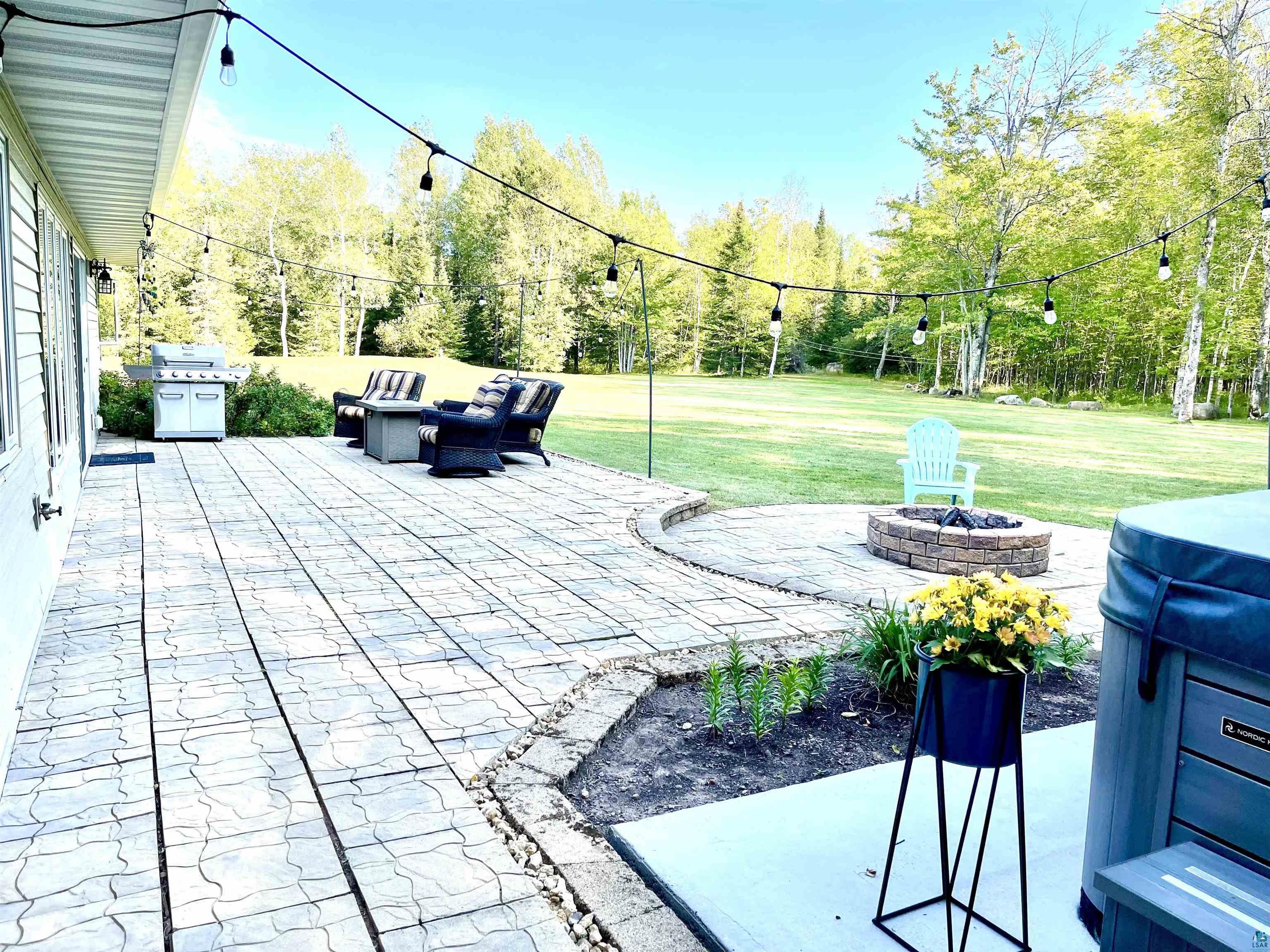 5770 Rose Road Hermantown, MN 55811 - Photo 38 of 48 HUGE PATIO & HOT TUB AREA