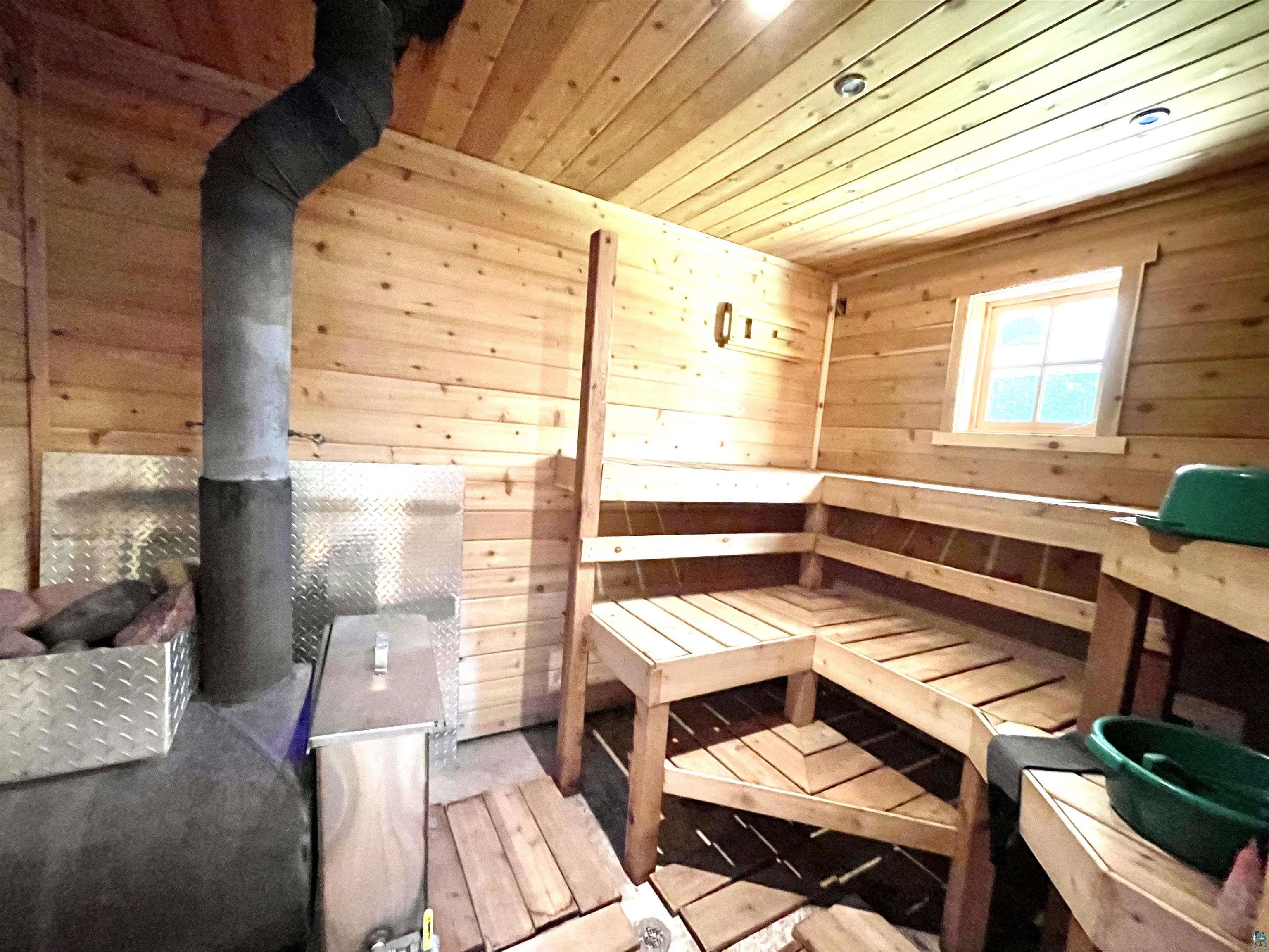 5770 Rose Road Hermantown, MN 55811 - Photo 44 of 48 WOOD FIRED SAUNA ROOM
