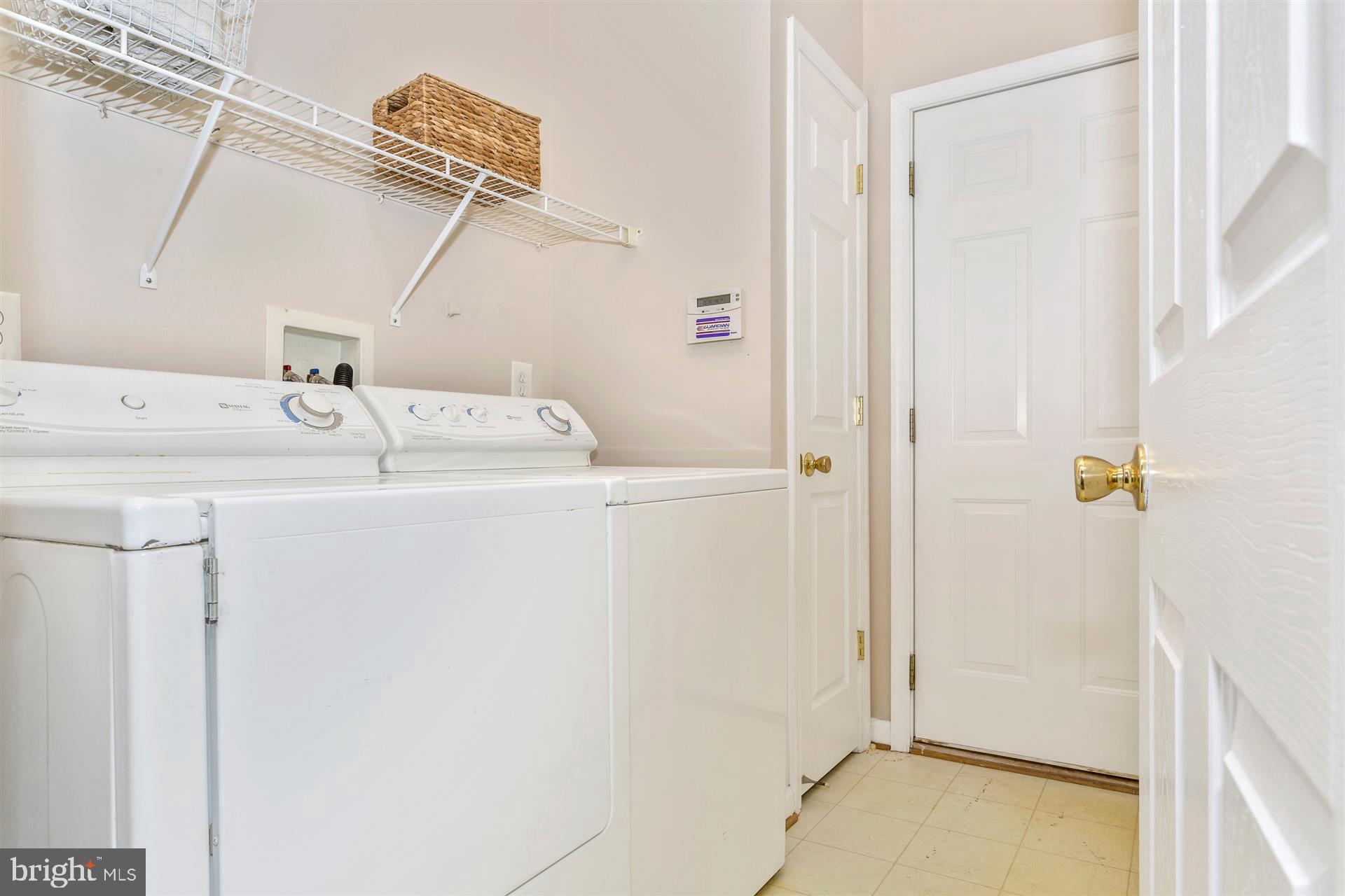 11223 Country Club Road New Market, MD 21774 - Photo 20 of 34 Laundry room with ample hanging space.