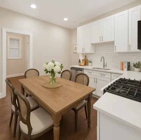 a view of a dining table and chairs