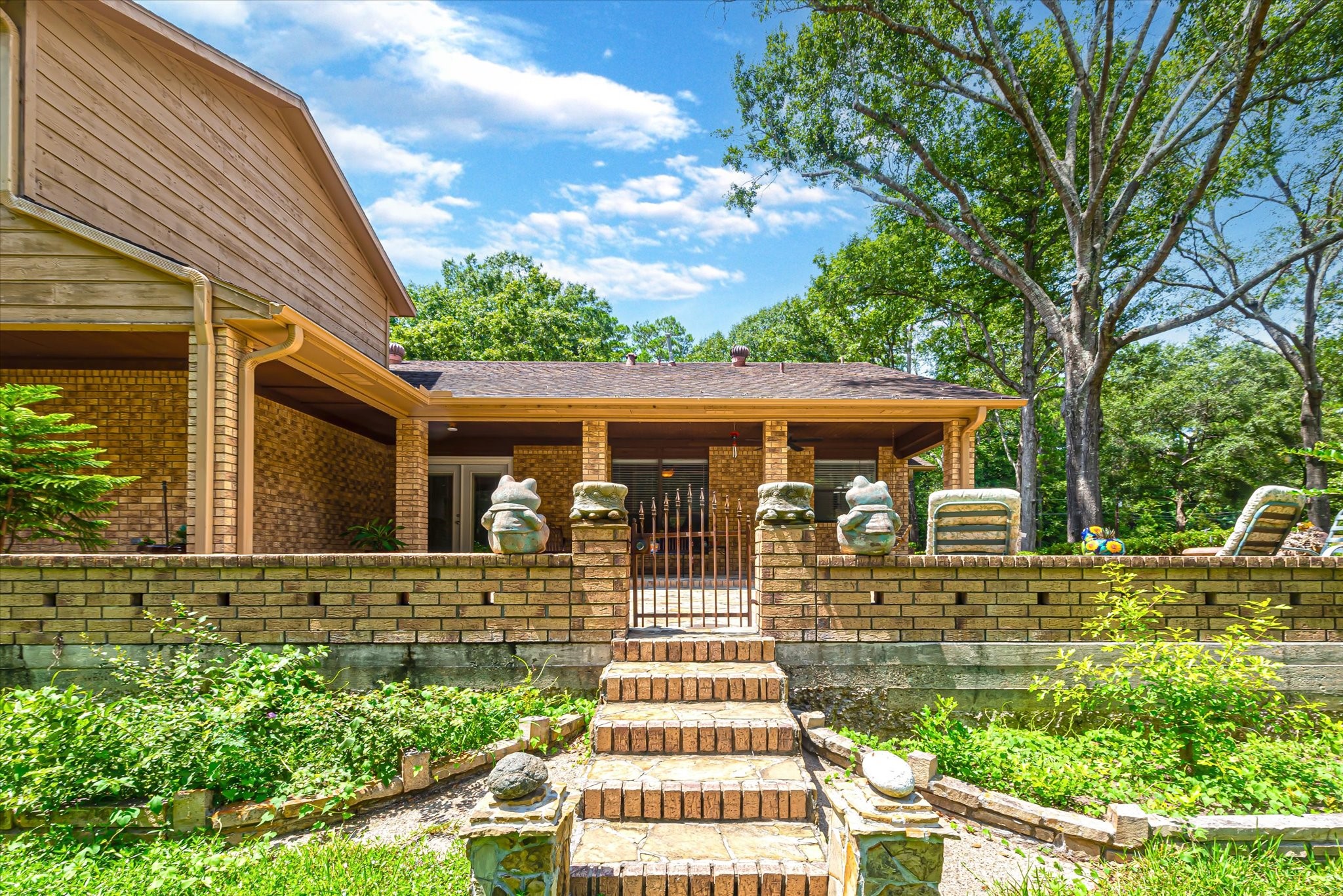 7715 Shadow Lane Conroe, TX 77304 - Photo 40 of 46 front view of a house with a yard