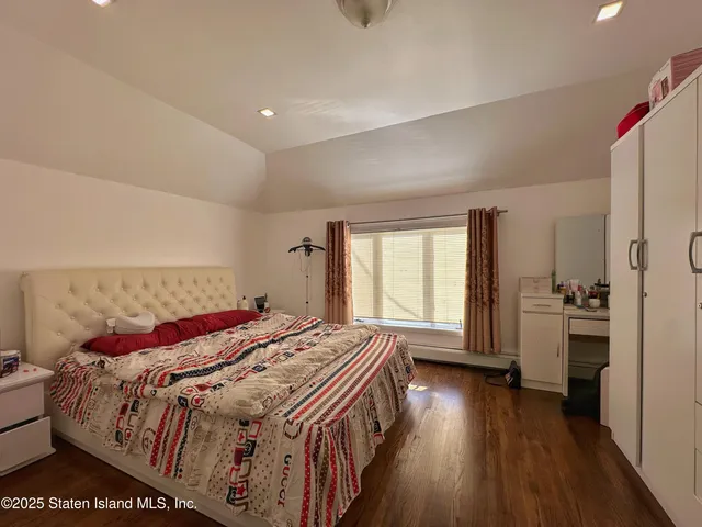 a bathroom with a toilet a sink and a shower