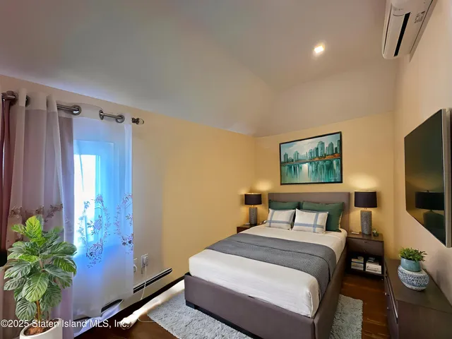 a front view of a house with parking space