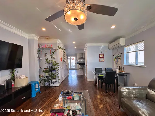 a kitchen with a refrigerator a sink and cabinets