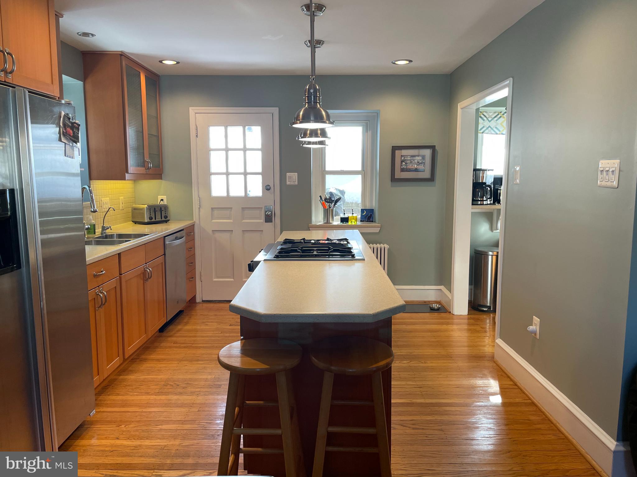 122 East Waverly Road Wyncote, PA 19095 - Photo 12 of 39 Kitchen flows to the back door and breakfast nook.