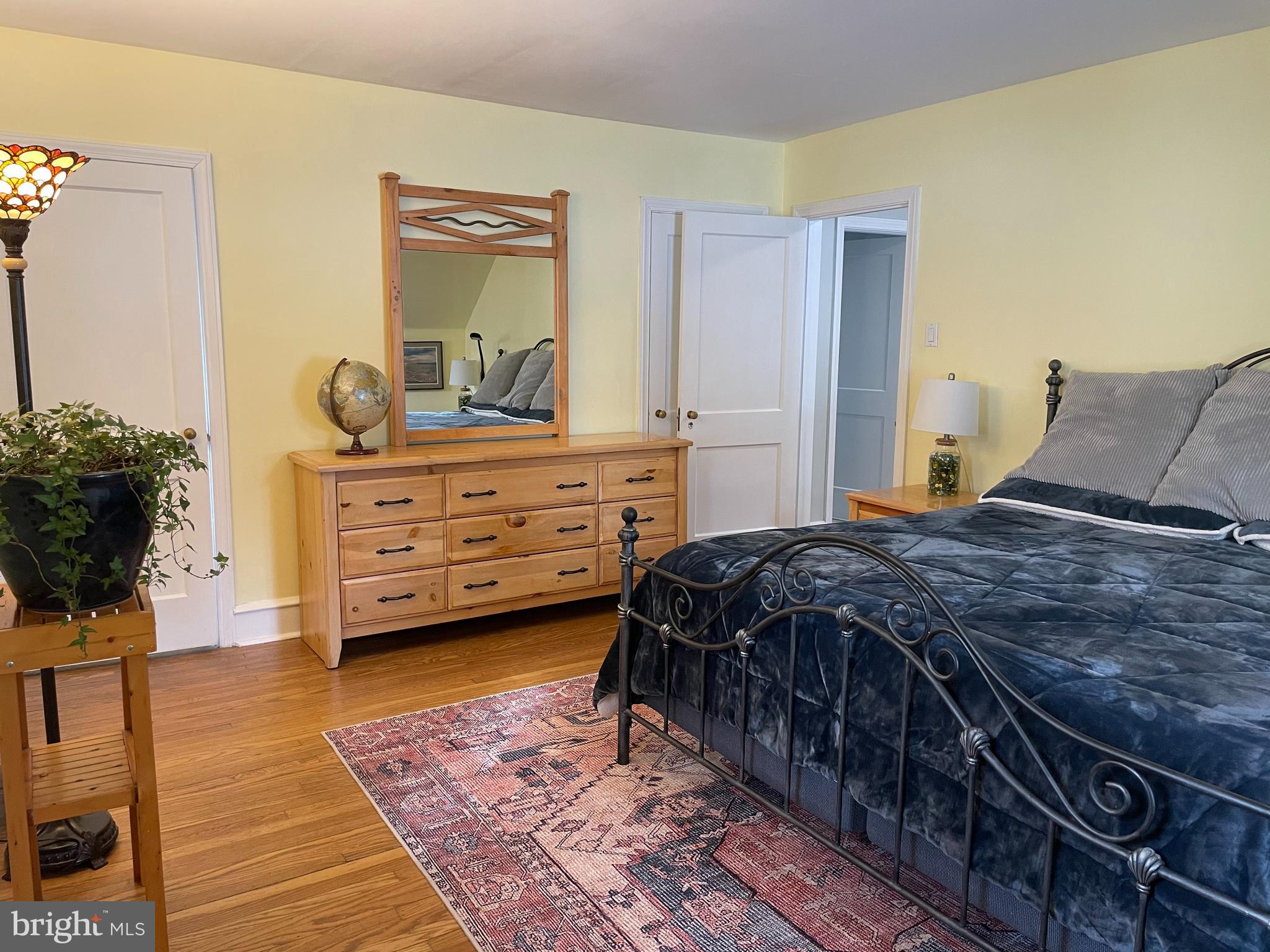 122 East Waverly Road Wyncote, PA 19095 - Photo 18 of 39 The hardwood shines in the Primary bedroom